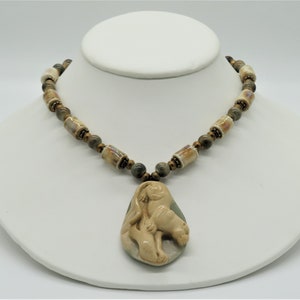 Carved Succor Creek Jasper Climbing Mountain Lion Pendant Necklace