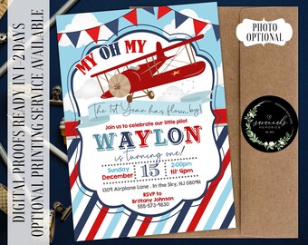 May include: A red, white, and blue airplane themed first birthday party invitation for a boy named Waylon. The invitation features a red airplane with blue and white stripes and the text "My Oh My The 1st Year Has Flown By! Join us to celebrate our little pilot Waylon is turning one! Sunday December 15 2:00pm til 4pm 1309 Airplane Lane, In the Sky, NJ 08094 RSVP to Brittany Johnson 555-573-9830".