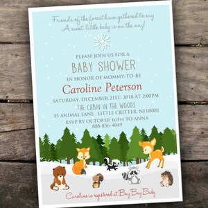 May include: A blue and white baby shower invitation with a winter woodland theme. The invitation features a snowflake, pine trees, and woodland animals like a fox, deer, raccoon, squirrel, and hedgehog. The text reads "Friends of the forest have gathered to say A sweet little baby is on the way! Please join us for a baby shower in honor of mommy-to-be Caroline Peterson Saturday, December 21st, 2018 at 2:00pm The Cabin in the Woods 55 Animal Lane, Little Critter, NJ 08081 RSVP by October 16th to Anna 888-856-4049 Caroline is registered at Buy Buy Baby"