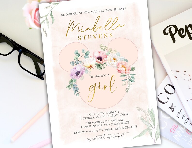 May include: A pink and gold baby shower invitation with a floral design and the text "Miabella Stevens is having a girl".