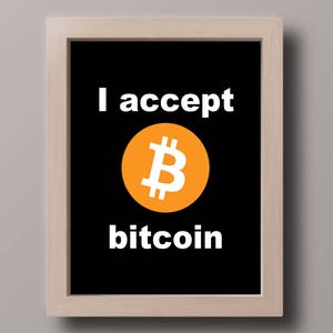 May include: A framed print with a black background and white text that reads "I accept bitcoin". A large orange circle with a white bitcoin symbol is in the centre of the print.