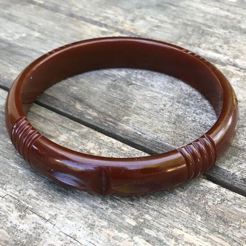 Carved dark red Bakelite bangle 12