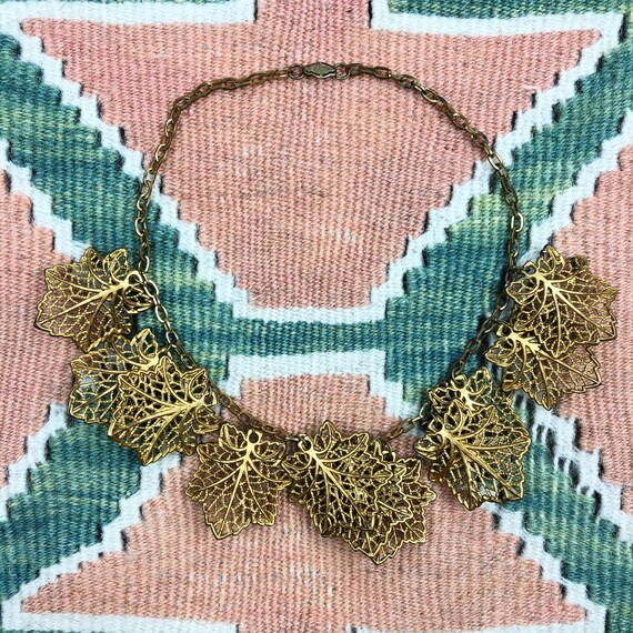 1940’s gold celluloid dangle leaf necklace