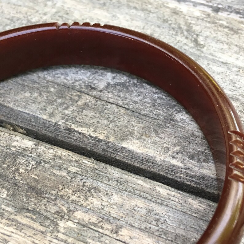Carved dark red Bakelite bangle 12