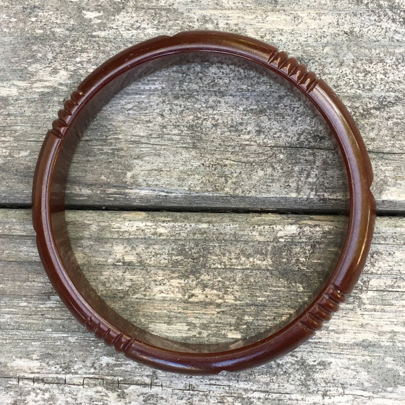 Carved dark red Bakelite bangle 12