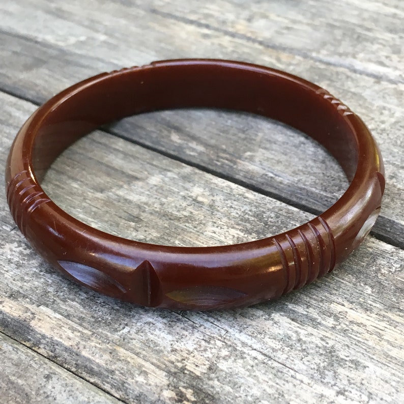 Carved dark red Bakelite bangle 12