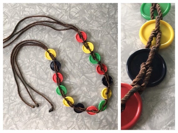 40’s novelty plastic button & cord belt