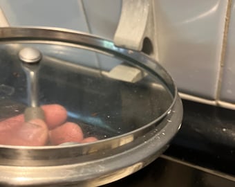 Hot Lid Holder:  Flip your lid and get it out of the way while cooking