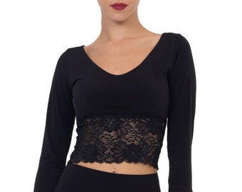 May include: A black long-sleeved crop top with a lace trim. The top has a v-neck and is made of a soft, stretchy fabric.