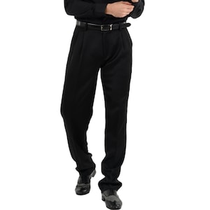 May include: Black dress pants with a pleated front and a belt.