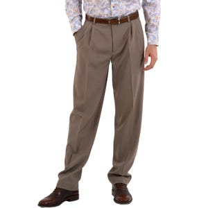 May include: A pair of light brown pleated pants with a brown belt.