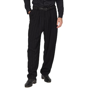 May include: Black pinstripe pants with a belt. The pants have a wide leg and are pleated at the waist.