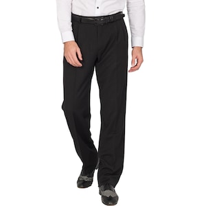 May include: Black dress pants with a belt loop and a belt. The pants have a pleated front and a straight leg.
