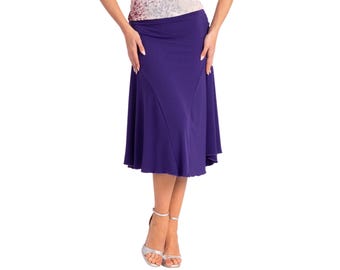 May include: A purple knee-length skirt with a flared hem. The skirt is made of a soft, stretchy fabric.
