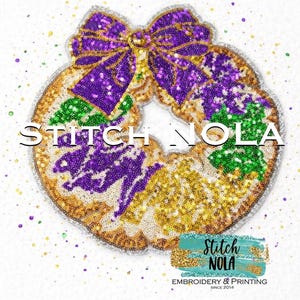 May include: A circular, sequined design with a purple bow and the text "STITCH NOLA". The design features gold, green, and purple sequins, with a smaller logo that says "Stitch NOLA Embroidery & Printing Since 2014".