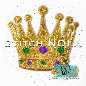 May include: A gold sequined crown with green and purple accents, and the text "STITCH NOLA". The crown is a symbol of royalty and celebration. The image also includes a teal and gold logo with the text "Embroidery & Printing Since 2014".