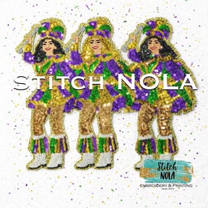 May include: Three sequined figures in Mardi Gras attire, holding microphones. The figures wear gold, green, and purple outfits with matching hats and boots. The image includes the text "STITCH NOLA" and "Embroidery & Printing since 2014".