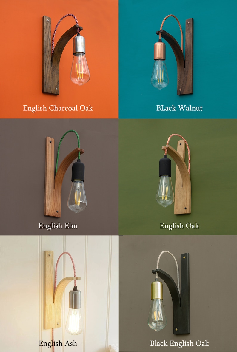 May include: Six wall-mounted light fixtures with different wood finishes and cord colours. The wood finishes include English Charcoal Oak, Black Walnut, English Elm, English Oak, English Ash, and Black English Oak. Each fixture has a single light bulb.