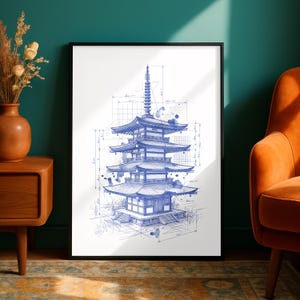 May include: A framed wall art print featuring a blue ink architectural blueprint sketch of a multi-tiered Japanese pagoda. The illustration includes technical measurement lines, grid patterns, and abstract watercolor ink splatters on white paper.