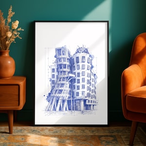 May include: A framed architectural print featuring a blue ink sketch of a deconstructivist building with curved, distorted walls and multiple windows. The drawing includes faint technical grid lines and structural markings on a white background.