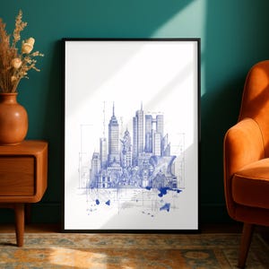 Può includere: Una stampa d'arte verticale incorniciata che presenta uno schizzo architettonico a inchiostro blu di uno skyline cittadino. Il disegno include grattacieli dettagliati, edifici storici e linee di misurazione tecniche, con schizzi artistici di inchiostro acquerello blu alla base.