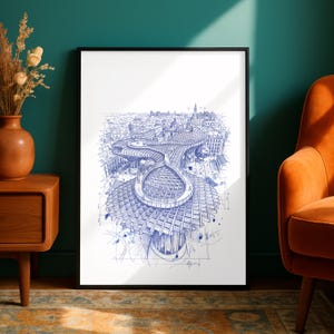 May include: A framed print of a blue ink architectural drawing depicting a modern structure over a city. The artwork is set against a white background, framed in black, and displayed in a room with an orange armchair and wooden furniture.