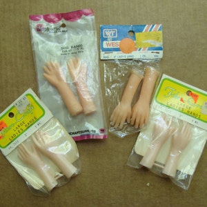 4 pairs beige plastic doll hands - 2 1/2" to 2 3/4" long - vintage doll hands - new in package - ivintage doll making parts lot