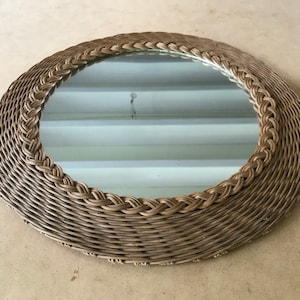 Mirror in woven plant fibers, rattan