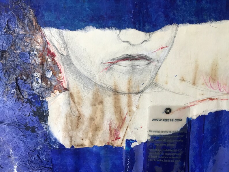 May include: A close-up of a mixed media artwork featuring a pencil drawing of a person's face with red and brown accents. The face is partially obscured by a blue piece of paper. A clear plastic tag with the text "www.rgs12.com" is visible in the lower right corner.