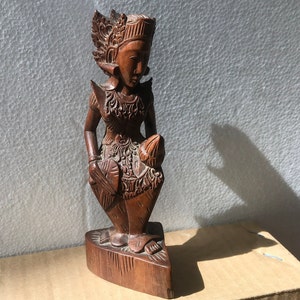 Miniature Indonesian Balinese statuette, dancer dressed in traditional clothing