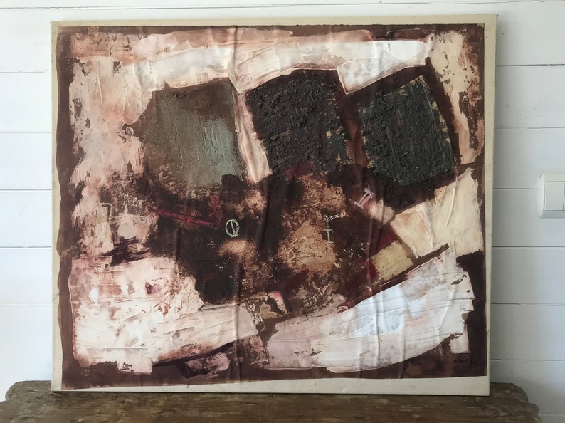 Puede incluir: Pintura abstracta sobre lienzo con pintura marr&oacute;n, blanca y verde. La pintura tiene una superficie texturizada y est&aacute; enmarcada en un marco de madera simple.