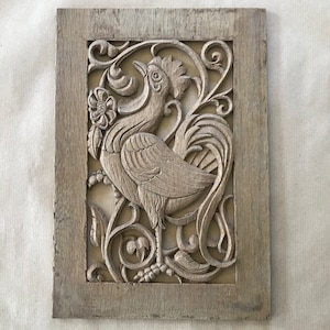 Carved wooden panel, rooster in flowers