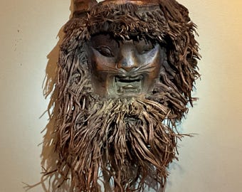 Chinese mask carved from bamboo, circa 1950