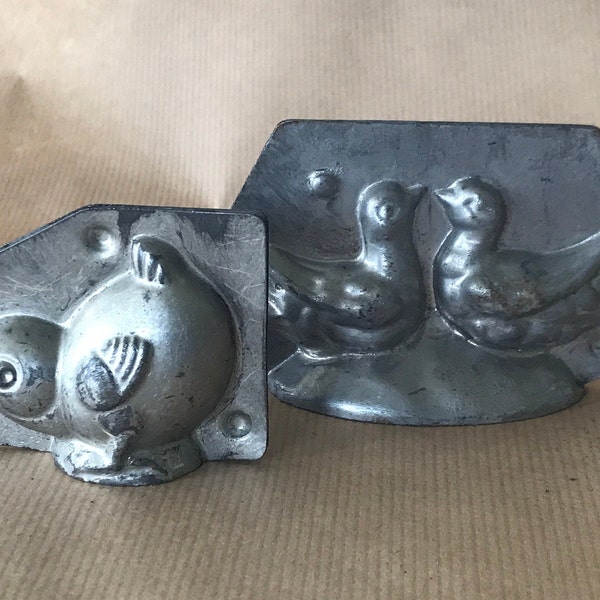 Chocolate molds, tinned metal, couple of pigeons and chick