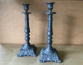 Pair of metal candlesticks