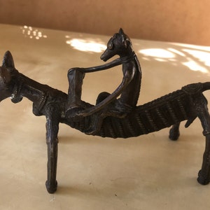African bronze, animal on the back of a horse, lost wax bronze