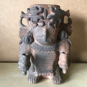 Mayan-inspired terracotta statuette