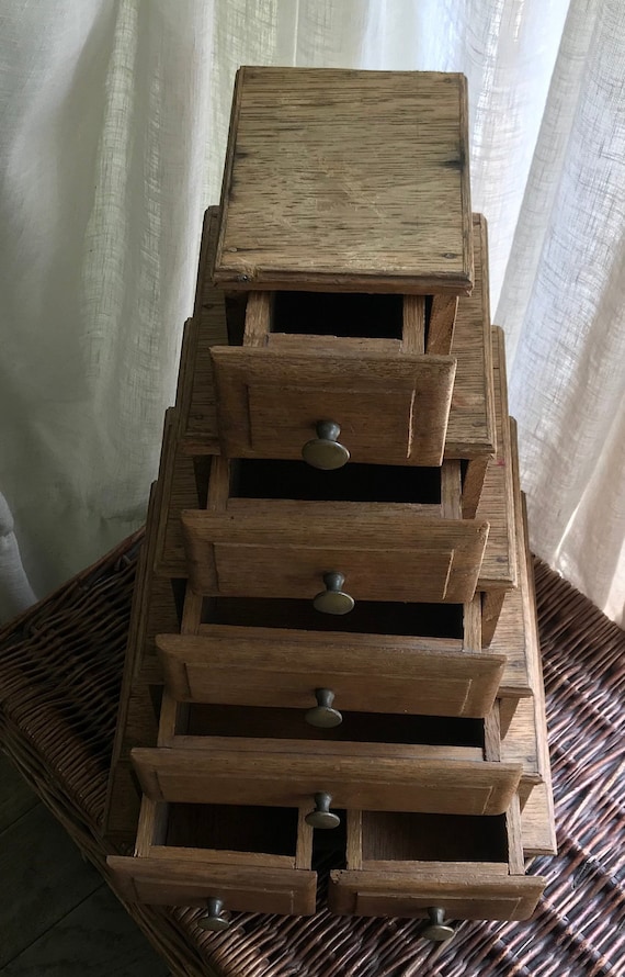 Small oak and very heavy piece of furniture