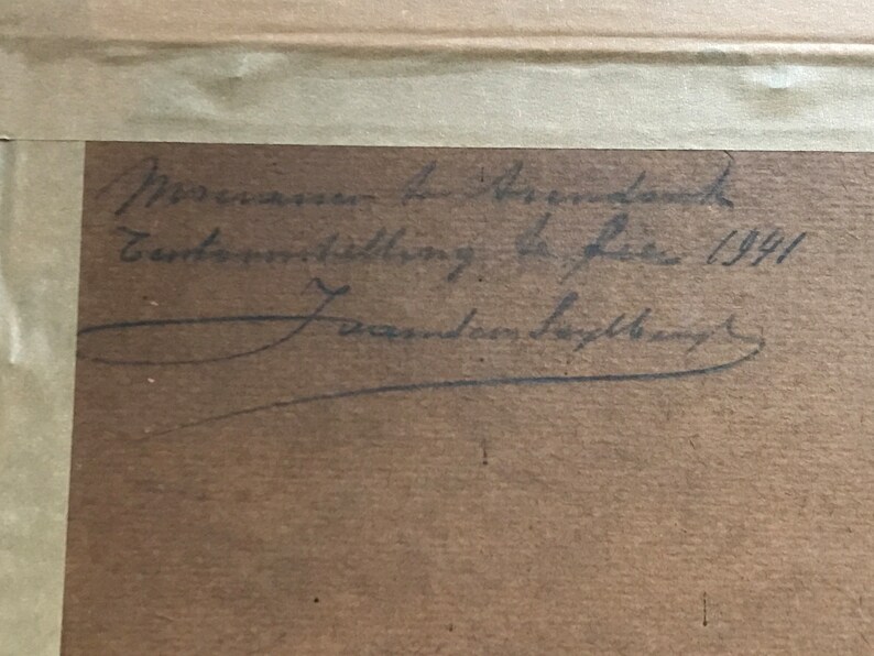 May include: A close-up of a brown paper with black ink handwriting. The text reads "Museum in Amsterdam, Tentoonstelling de Luxe 1941,  J. van den Bergh".