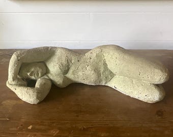 Terracotta statue, reclining nude woman