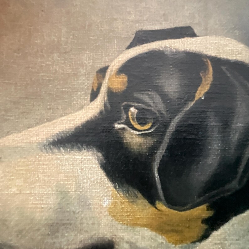 May include: A close-up of a dog's head, painted in a classic style. The dog has black fur with white markings and tan accents around the ears and eyes. The dog's eye is a warm, golden color, and the background is a muted, neutral tone.