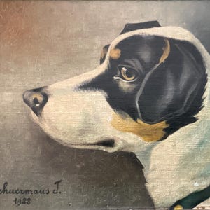 May include: An oil painting of a dog's profile, featuring a black and white coat with tan accents. The dog is wearing a green collar. The artist's signature and the year 1928 are visible in the lower left corner. The background is a muted gray.