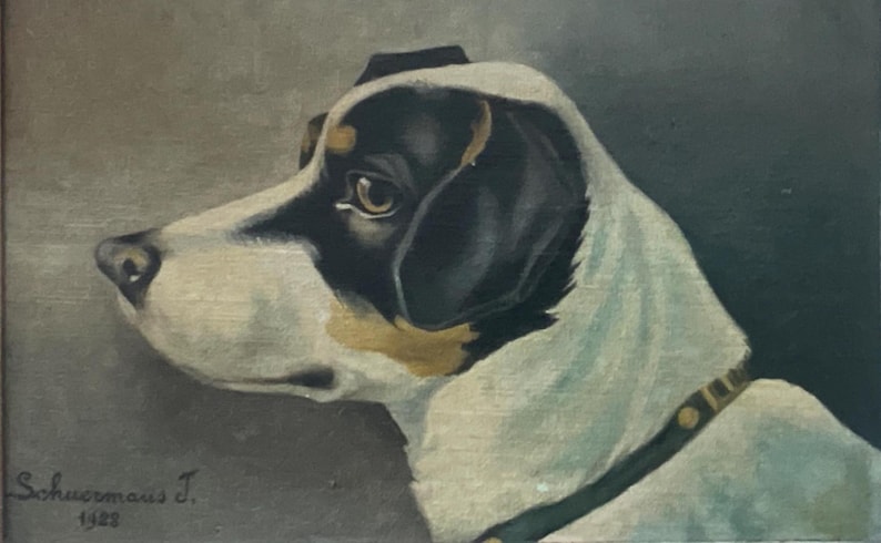 May include: A vintage painting of a dog's head in profile. The dog has a black and white coat with tan markings around the ears and eyes. It wears a dark collar. The artist's signature and the year 1923 are visible in the lower left corner.