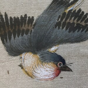 May include: A close-up of a painting of a bird with gray and black feathers. The bird's head is turned to the side, and its eye is visible. The bird's beak is open, and its tongue is sticking out.