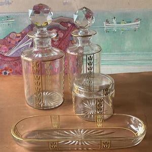 Set of crystal bottles, box and dish for bathroom cabinet