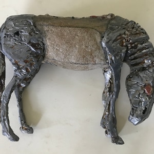 Horse sculpture in various materials.