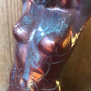 Statuette, body of a naked woman in ceramic