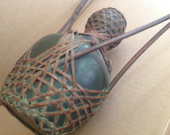 Japanese terracotta vase with bamboo braiding