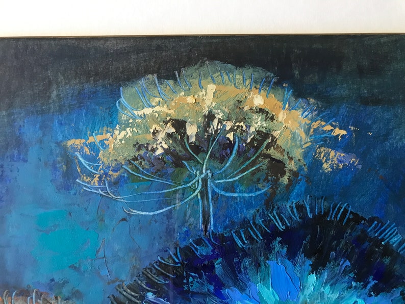 May include: Abstract painting of a large, white flower with blue and green accents against a dark blue background.