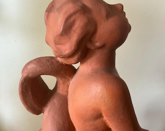 Terracotta statuette, cherub on a dolphin, Adrien Mertens
